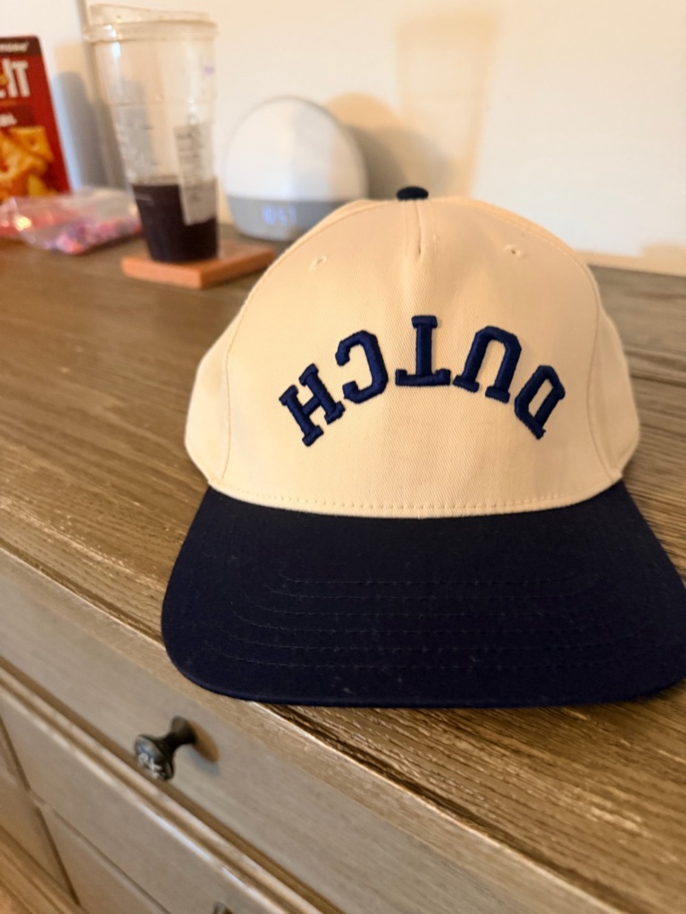 Dutch Bros Cream and Navy Kids Baseball Hat with Embroidered Logo